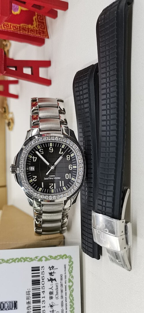 Luxury watch on a stand showing side profile of silver case and bracelet