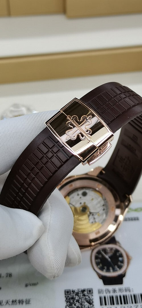 Brown leather strap watch with rose-gold clasp and diamond-set bezel