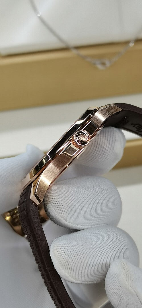 Rose-gold watch case with brown textured leather strap