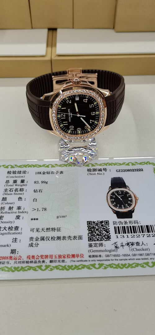 Brown leather strap wristwatch with black dial and diamond-set bezel with papers