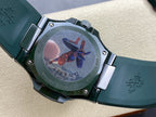 Wristwatch caseback with emblem and engraved text, green rubber strap