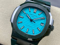 Patek Philippe wristwatch, blue dial, green rubber strap, dark bezel, date window