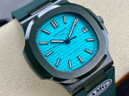 Wristwatch close-up, bright blue dial with hour markers and date window