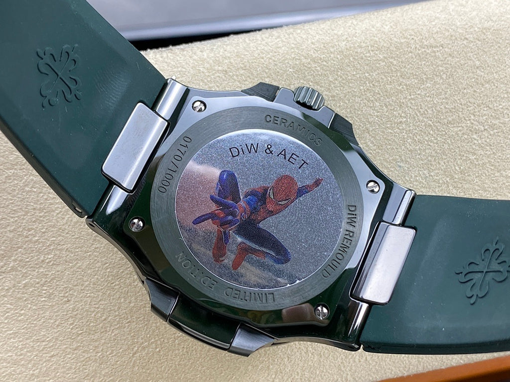 Patek Philippe diver-style watch case with dark bezel and engraved metal back panel