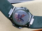 Patek Philippe diver-style watch case with dark bezel and engraved metal back panel