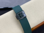 Patek Philippe watch buckle with dark green strap and square clasp
