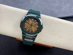 Patek Philippe watch on stand with brown dial and dark green strap