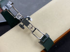 Patek Philippe watch bracelet with dark green strap links and silver metal clasp