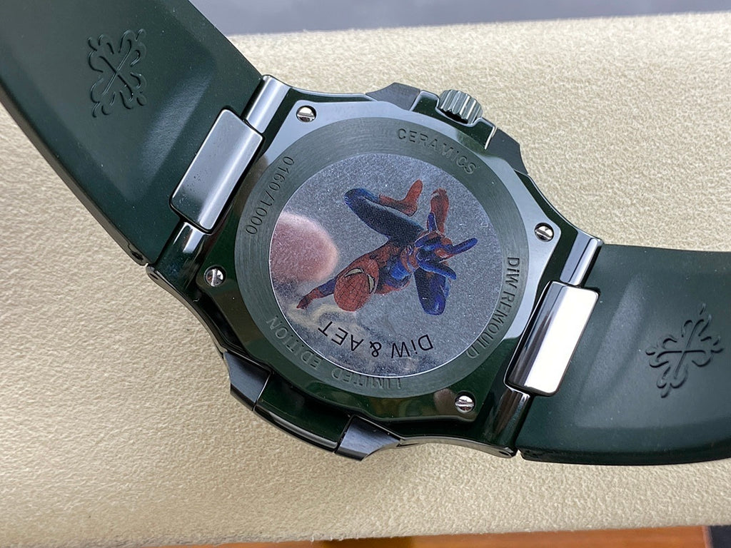 Patek Philippe watch caseback with butterfly engraving, dark green rubber strap