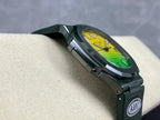 Patek Philippe watch side profile on dark green strap with AMG badge