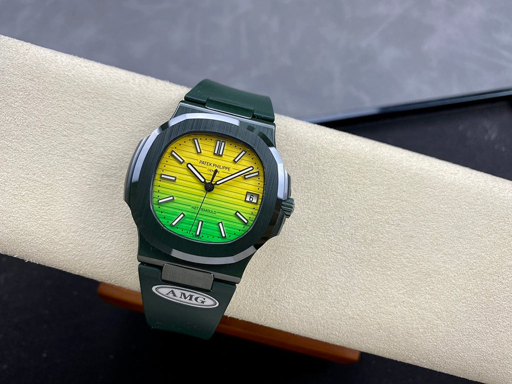 Patek Philippe sports watch with yellow dial, green lower band, dark green strap