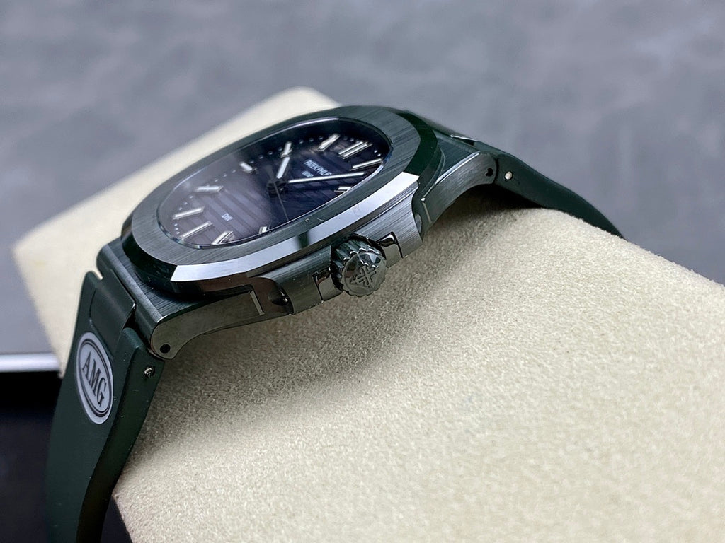 Patek Philippe wristwatch angled view with green rubber strap, silver case, dark blue dial