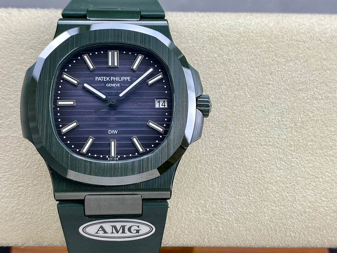 Patek Philippe wristwatch with dark blue dial, green rubber strap, date window showing 14