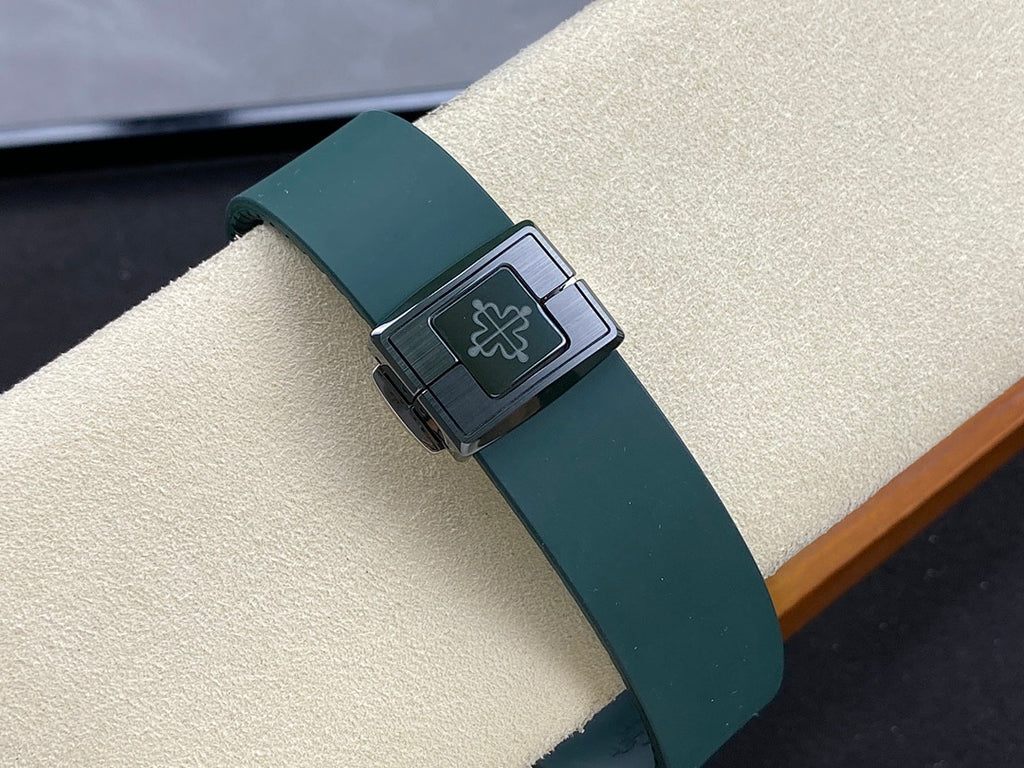 Patek Philippe watch strap buckle with logo panel and green band