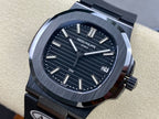 Luxury wristwatch with dark dial, silver baton markers, and date window at 3 o’clock