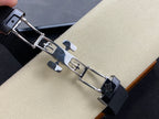 Patek Philippe watch bracelet with metal links and clasp, on black strap