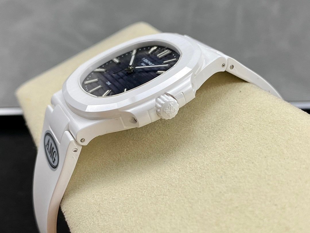 Patek Philippe wristwatch side profile with white case and textured crown