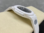 Patek Philippe wristwatch side view with white case and AMG logo on strap