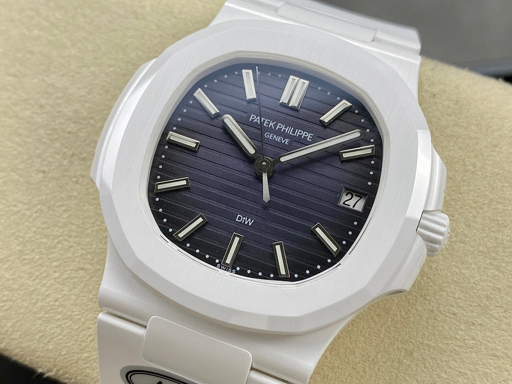 Patek Philippe wristwatch with white case and dark blue dial, rectangular hour markers