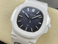 Patek Philippe wristwatch with white case and dark blue dial, rectangular hour markers