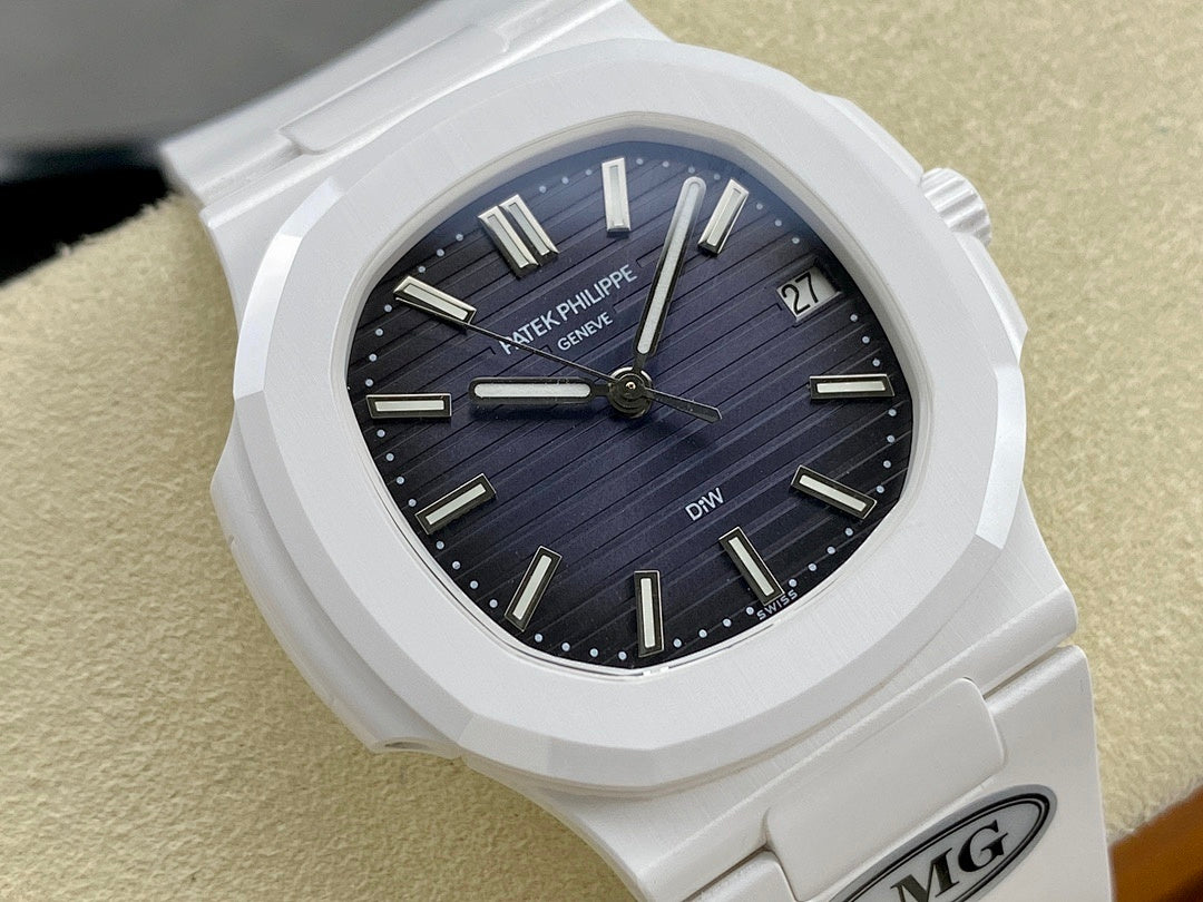 Patek Philippe wristwatch close-up with white bezel, dark blue dial, and date at 2