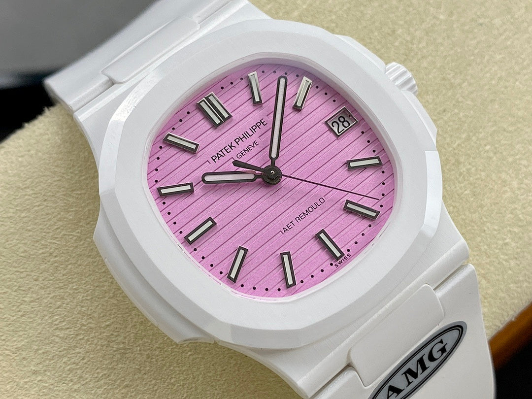 White wristwatch front view with pink dial, baton markers, and date window at 3 o’clock.
