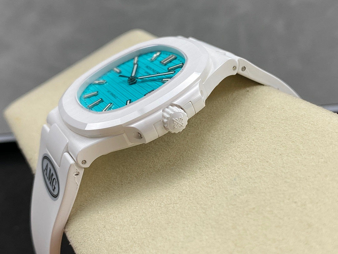 White wristwatch side profile with turquoise dial, crown, and strap lugs