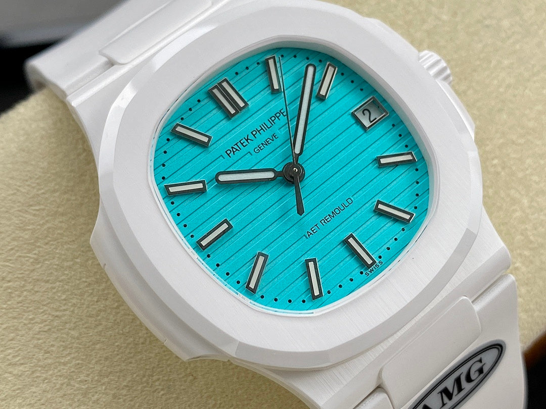 White wristwatch face with turquoise dial, baton hands, and date at 3