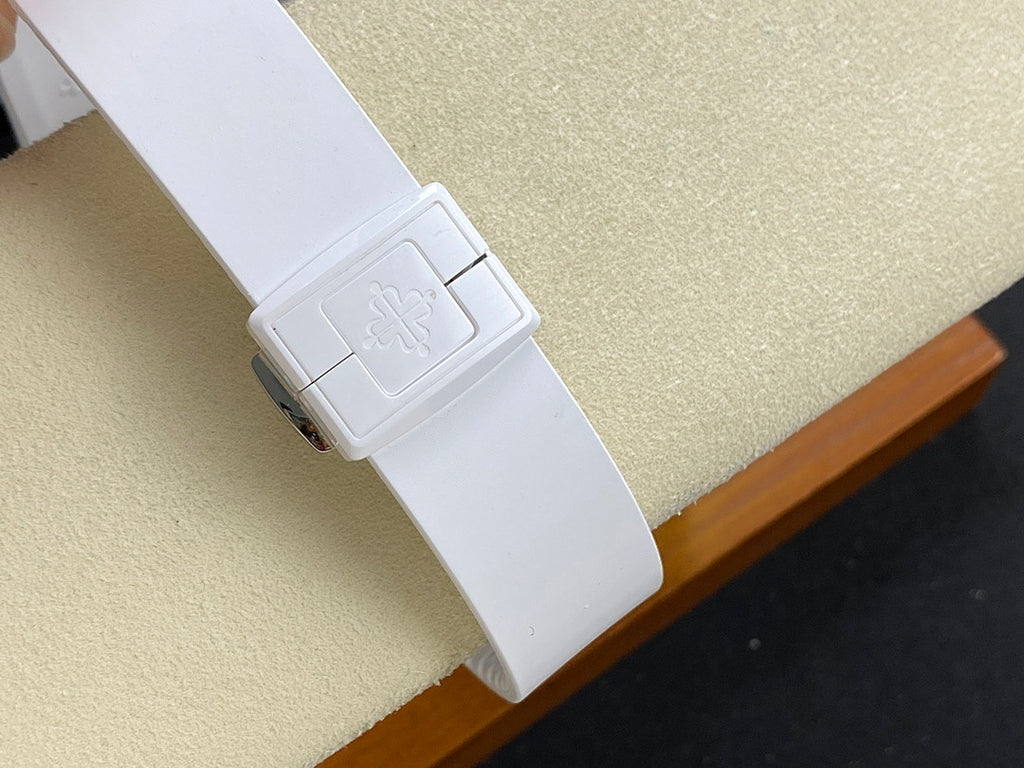 White watch clasp with embossed emblem