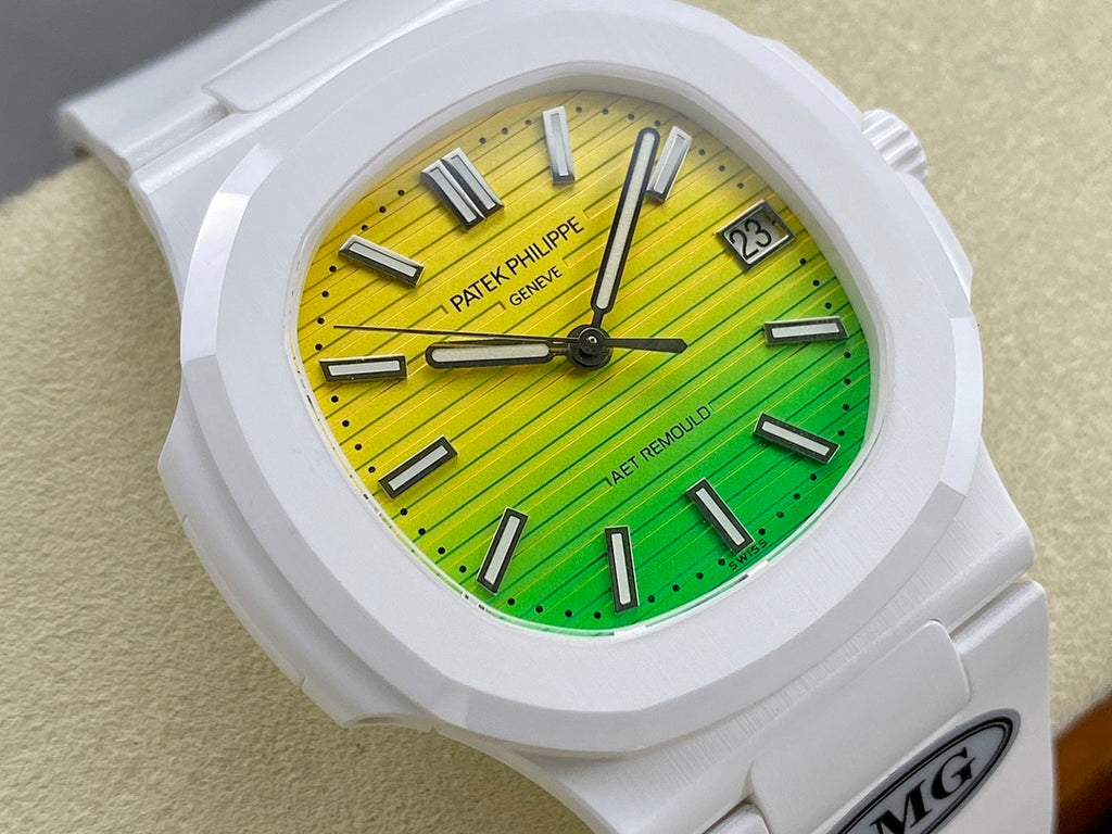 White sport watch close-up with green-yellow dial, baton markers, and date window