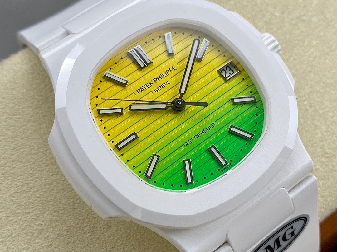 White sport watch close-up with green-yellow dial, baton markers, and date window