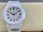 Patek Philippe wristwatch on beige cushion, white dial with black markers and date window
