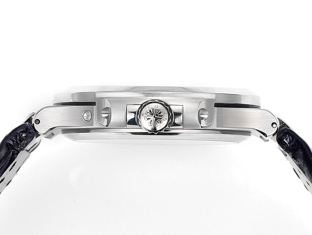 Wristwatch case profile with engraved emblem on the side and blue leather strap ends