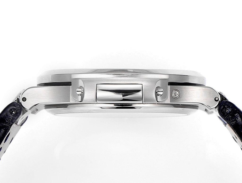 Wristwatch case with polished back plate, side details, and blue leather strap ends