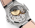 Patek Philippe watch close-up: silver case with exposed movement and black leather strap.