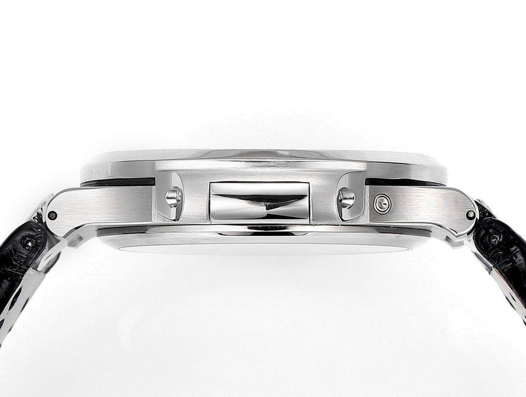 Patek Philippe watch case side with polished metal surfaces and crown area.