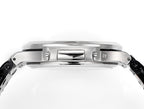 Patek Philippe watch case side with polished metal surfaces and crown area.