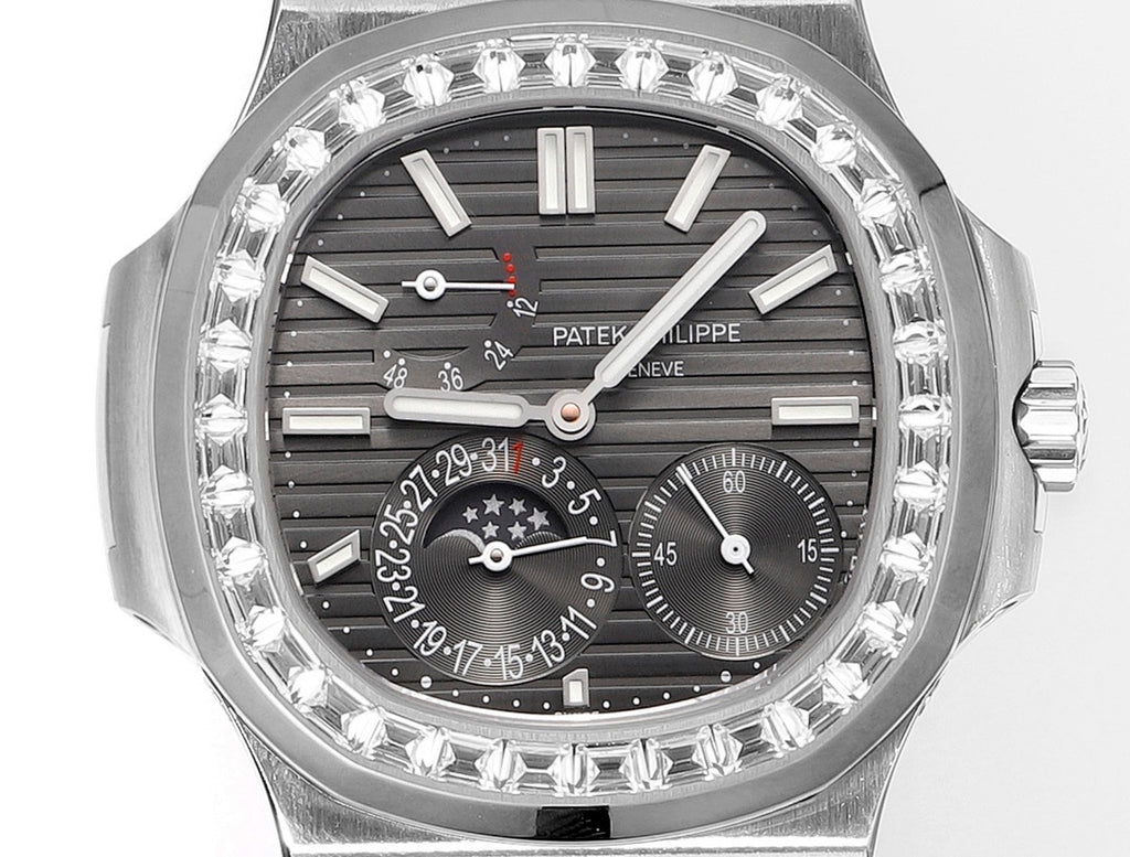 Patek Philippe watch face close-up with black dial, diamond bezel, and multiple subdials.