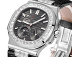 Patek Philippe watch close-up with black dial, diamond bezel, and silver crown at right.