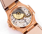 Patek Philippe rose-gold wristwatch with visible movement and brown leather strap