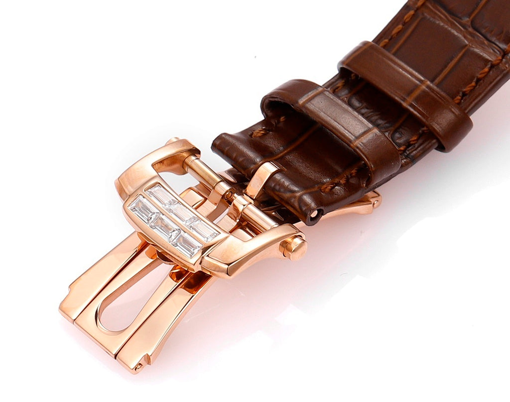 Patek Philippe rose-gold wristwatch with brown leather strap and rose-gold clasp