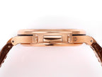 Patek Philippe rose-gold wristwatch case side with crown and strap lugs