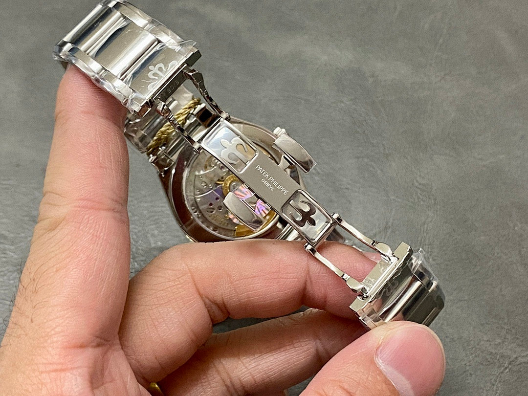 Patek Philippe steel watch showing bracelet and side crown details