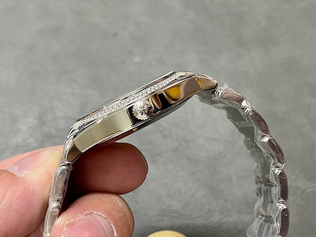 Patek Philippe steel watch case with diamond-set bezel and polished edges