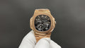 Patek Philippe rose gold wristwatch with black dial, chronograph subdials