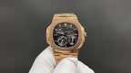 Patek Philippe rose gold wristwatch with black dial, chronograph subdials