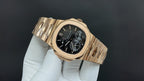 Patek Philippe rose gold bracelet wristwatch with black dial and subdials