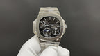 Stainless steel chronograph watch with black dial and silver subdials, centered front view