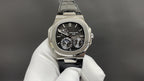 Patek Philippe watch, black dial with subdials, steel case and black leather strap