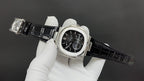 Patek Philippe watch on wrist, black dial with subdials and black leather strap